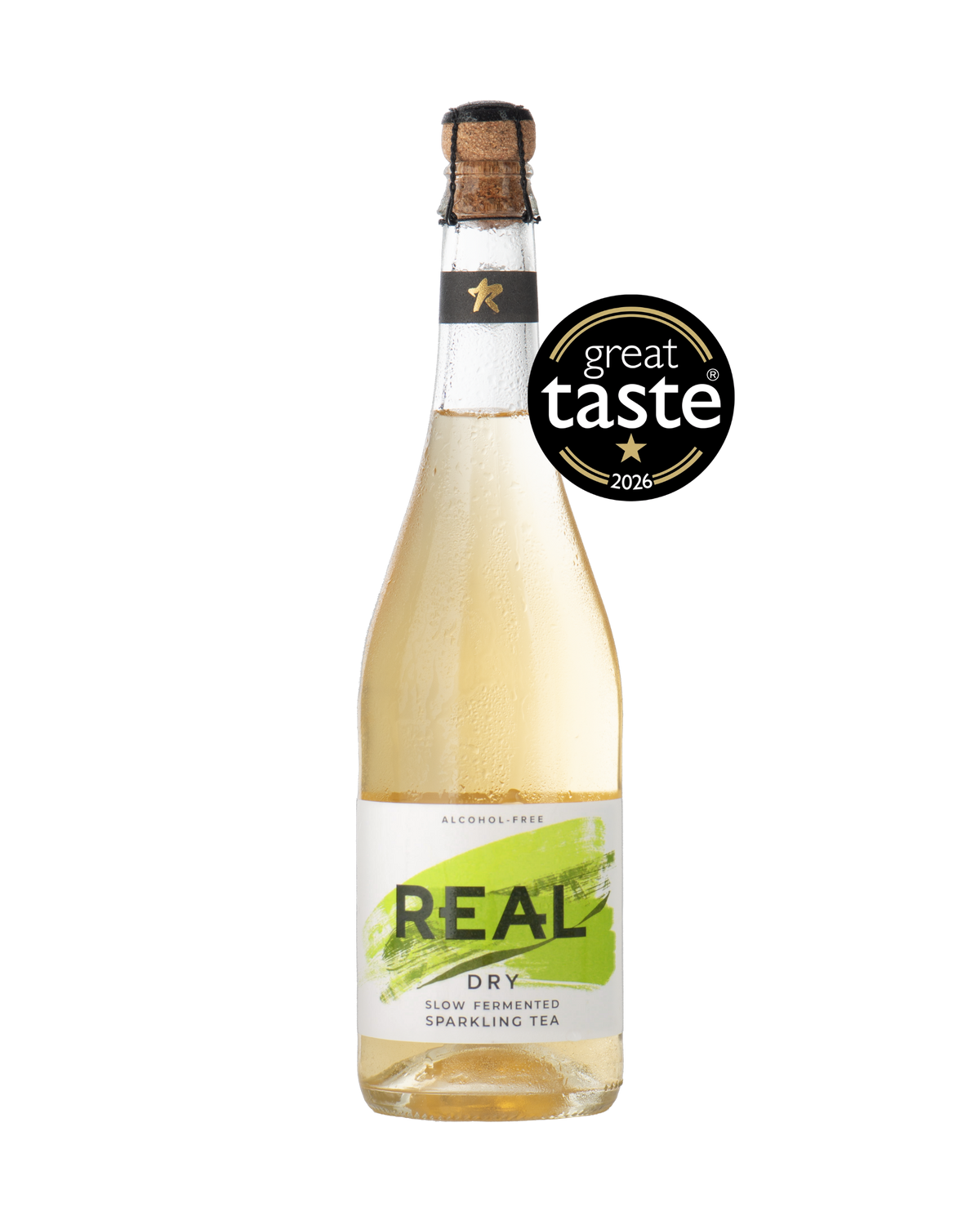 Bottle of REAL Dry Sparkling Tea on a transparent background with a 2026 Great Taste Award