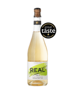 Bottle of REAL Dry Sparkling Tea on a transparent background with a 2026 Great Taste Award