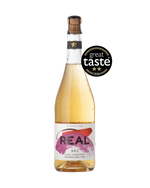 A bottle of REAL Sec alcohol-free sparkling tea with a cork stopper, filled with a light pink liquid, featuring a white and purple label. A black 'great taste 2026' award badge is overlaid on the upper right side of the bottle.