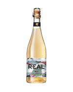 A bottle of REAL MEI Slow Fermented Sparkling Tea, featuring a clear glass bottle filled with pale golden tea, a cork stopper, and a colorful label with a mountain design.