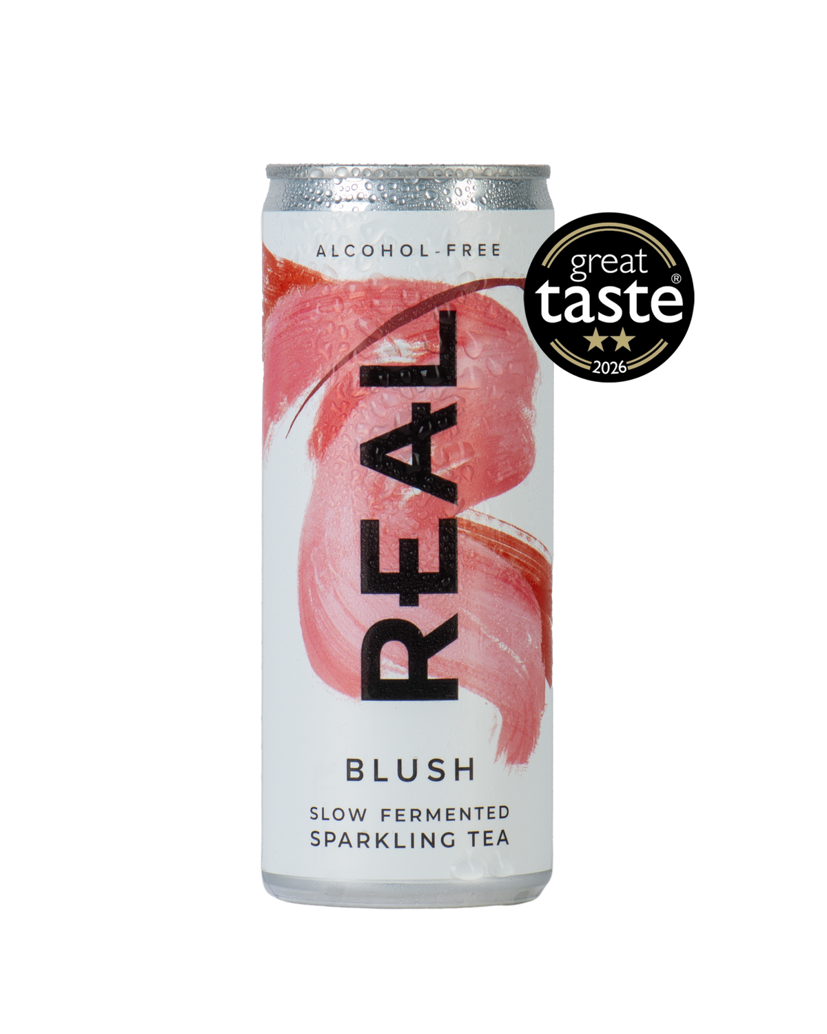 A can of REAL BLUSH Slow Fermented Sparkling Tea, featuring a white label with pink brushstrokes and bold black lettering, shown on a plain white background with a 'great taste 2026' badge.