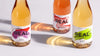 REAL Sec (Formerly Royal Flush), REAL Blush (Formerly Peony Blush), And REAL Dry (Formerly Dry Dragon) Bottle Trio, Homepage Hero